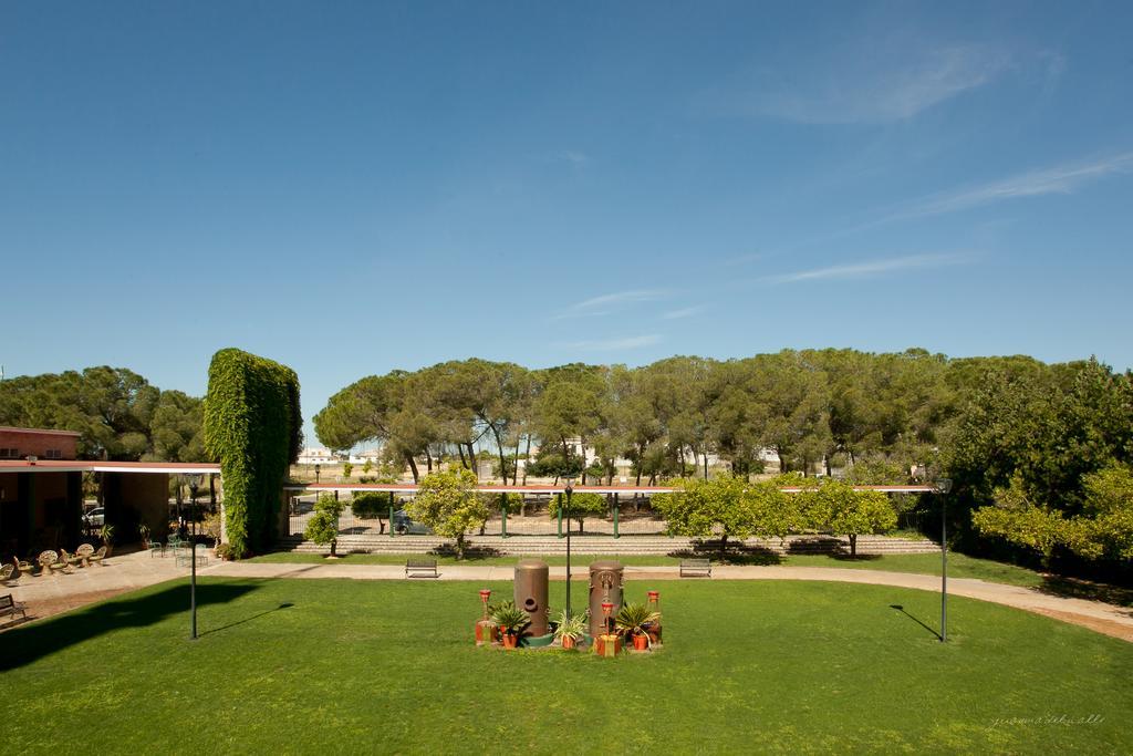 Lantana Garden Hotel Pilas Exterior photo